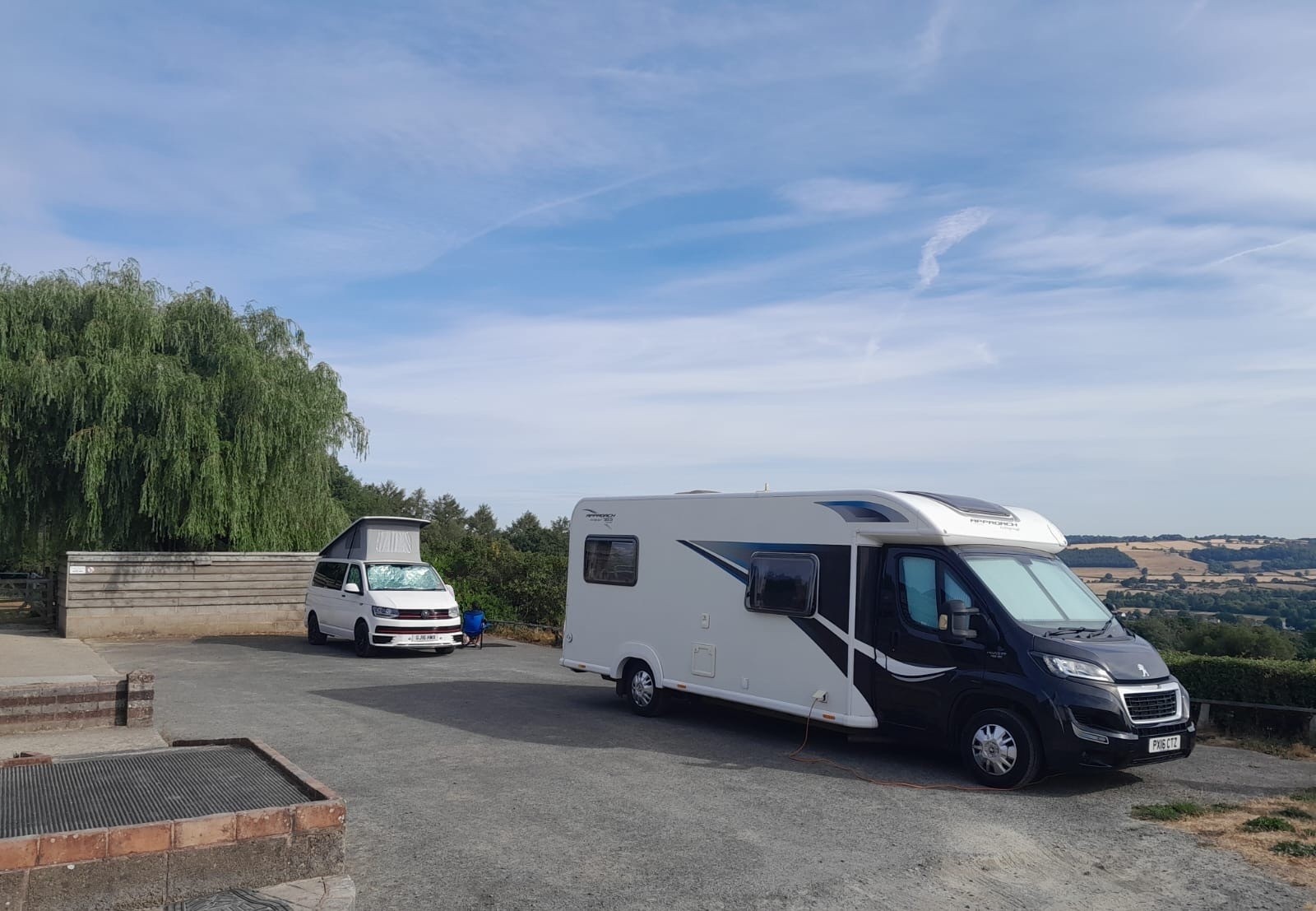 VW and large RV pitch at Whitcliffe Camp Site